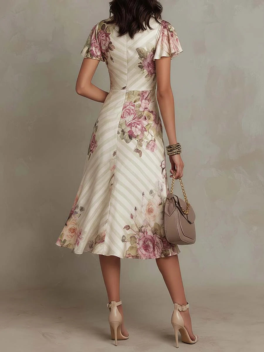 Alba | Elegante vestido midi de satén con flores retro