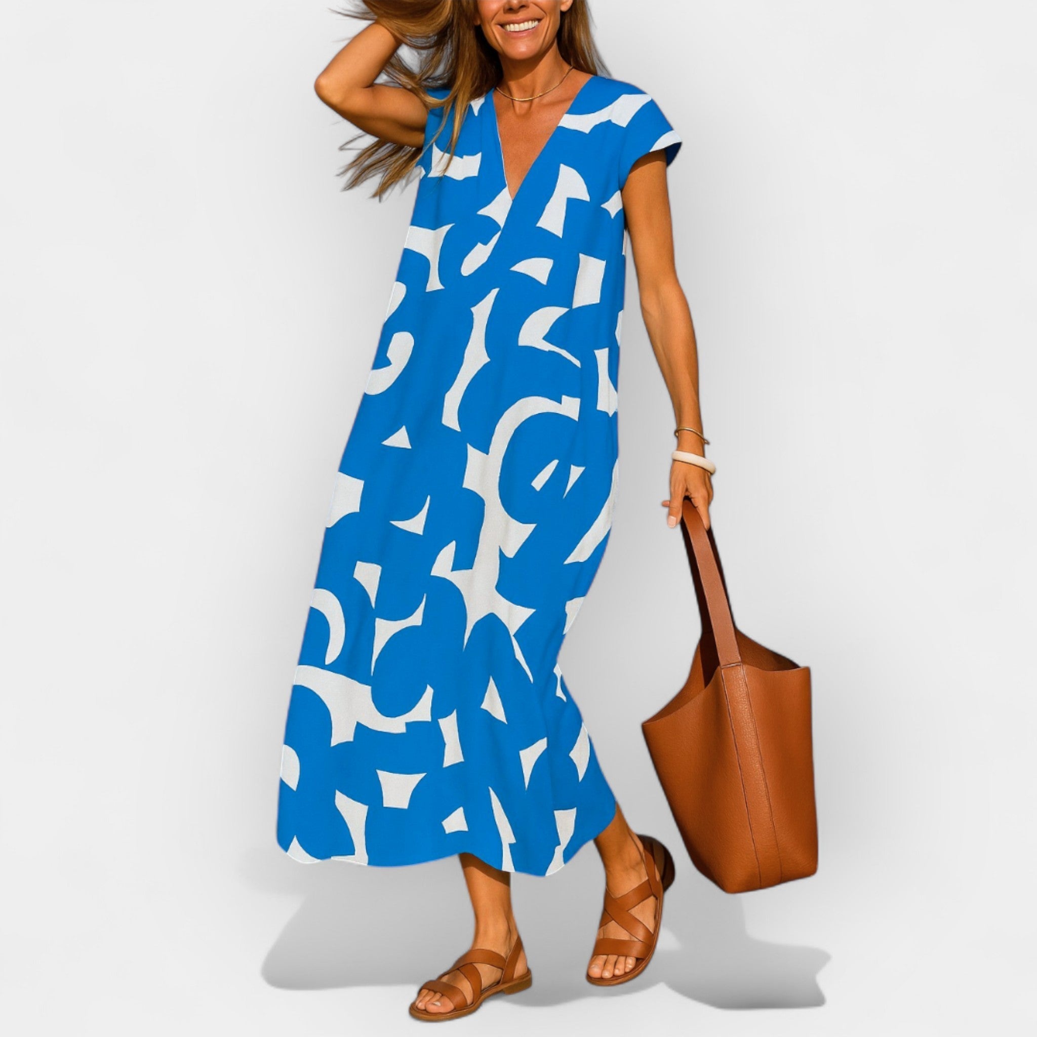 Vestido Aireoso con Escote en V y Diseño Moderno