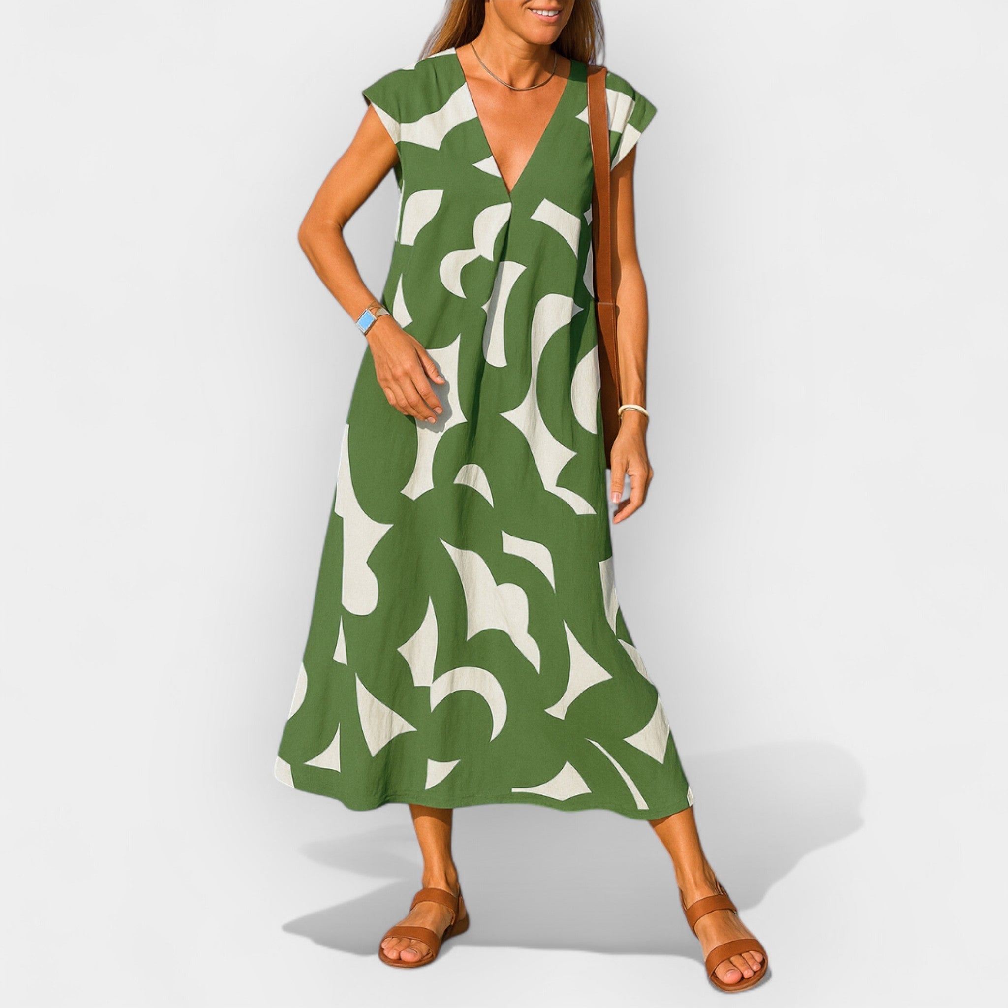 Vestido Aireoso con Escote en V y Diseño Moderno
