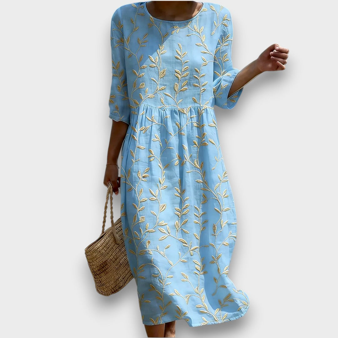Natalie | Vestido midi con escote redondo y estampado de plantas y flores