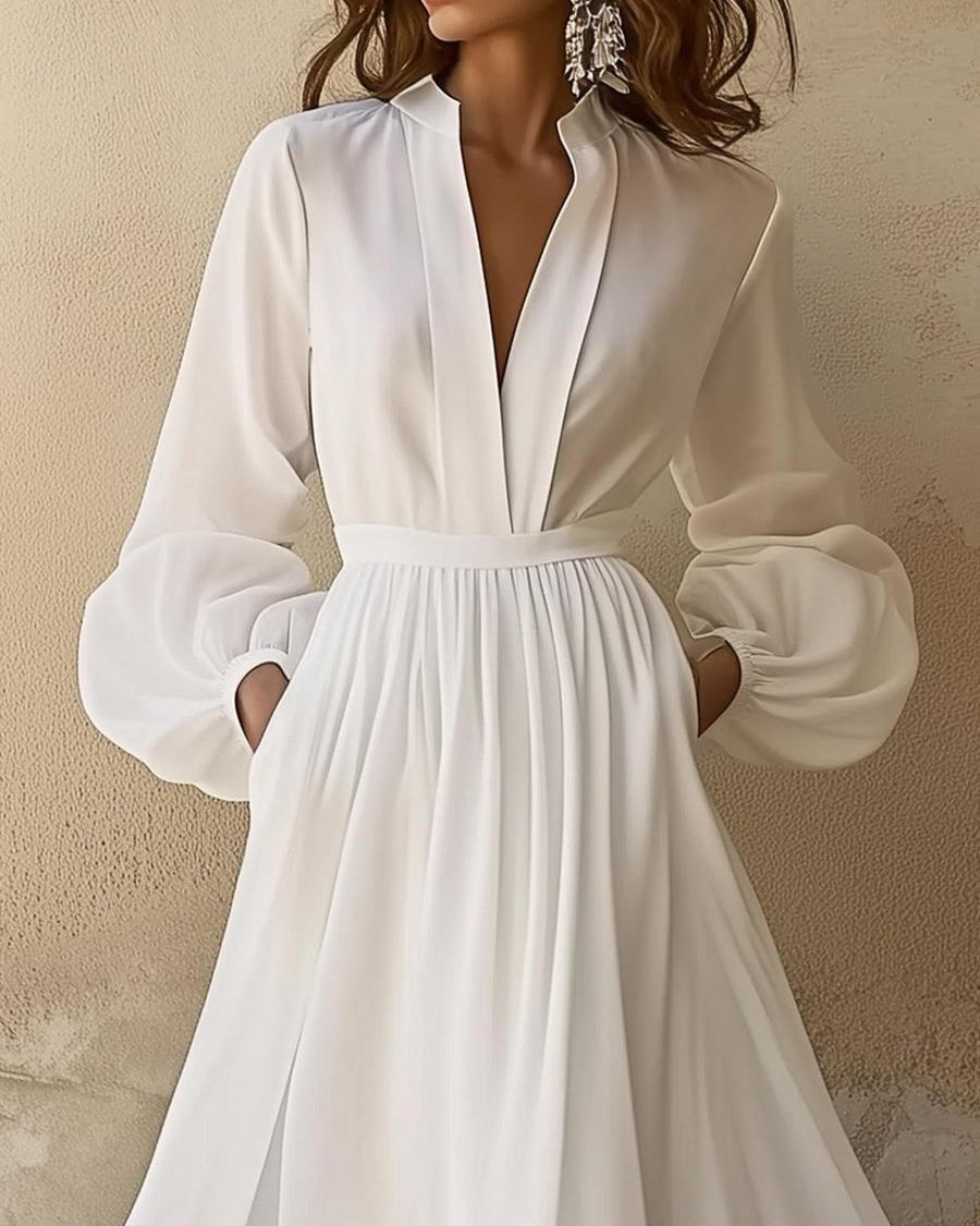 Ropa larga vintage blanca unida con cuello en V