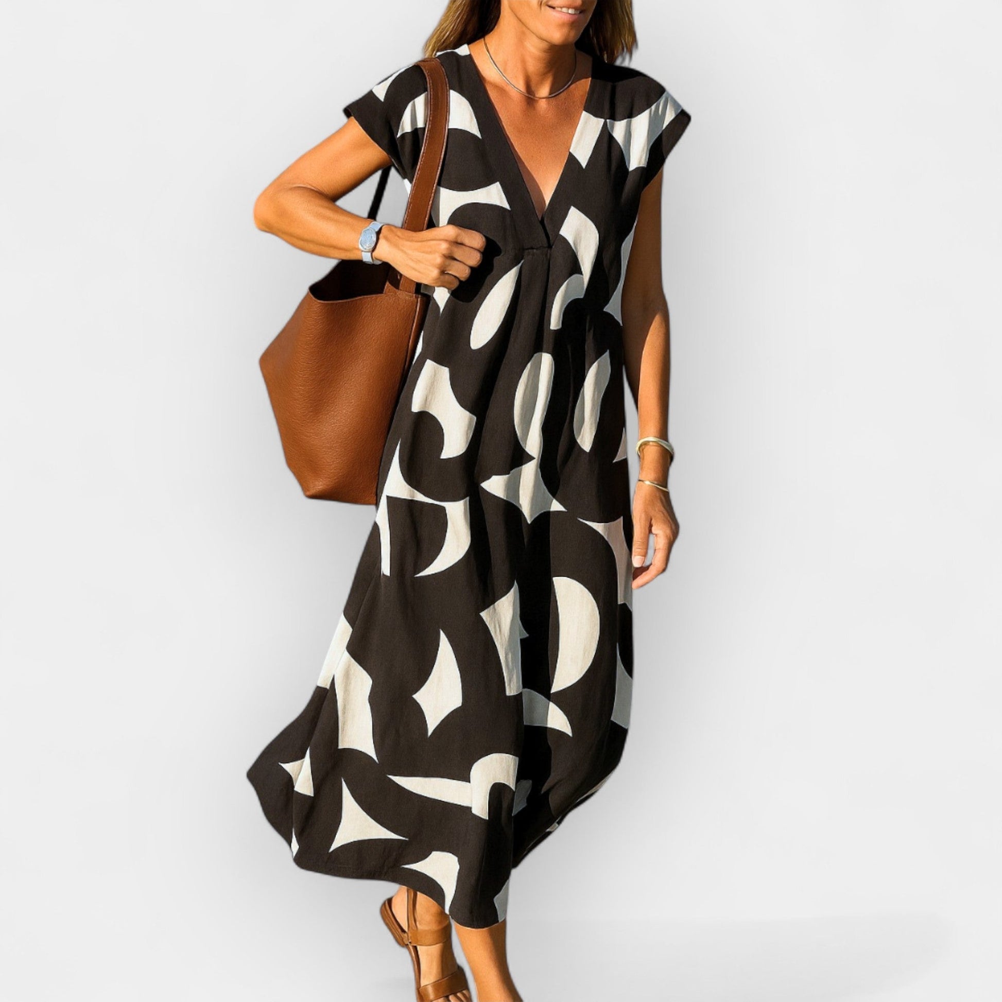 Vestido Aireoso con Escote en V y Diseño Moderno