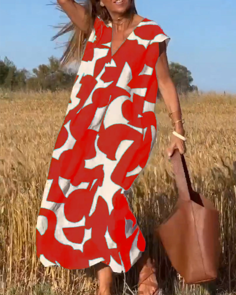 TATY - VESTIDO LARGO CON ESTAMPADO Y ESCOTE EN V