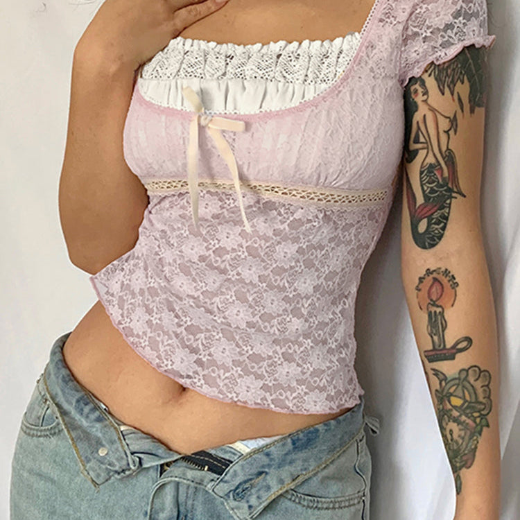 TOP CORTO CON RIBETE ROSA