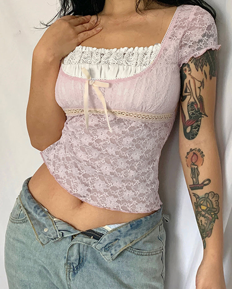 TOP CORTO CON RIBETE ROSA