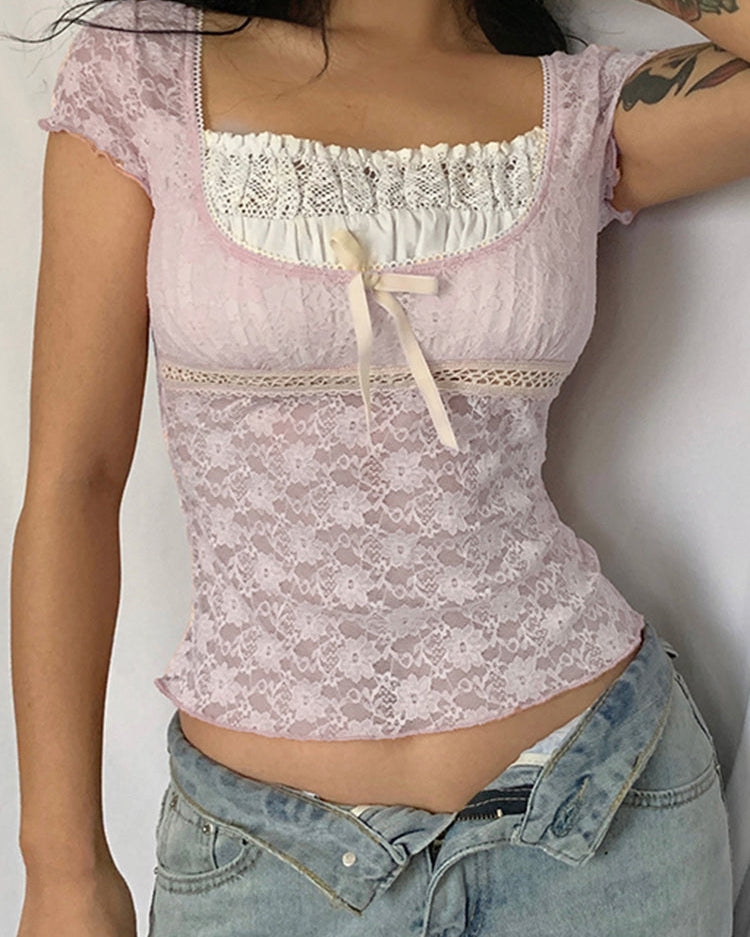 TOP CORTO CON RIBETE ROSA