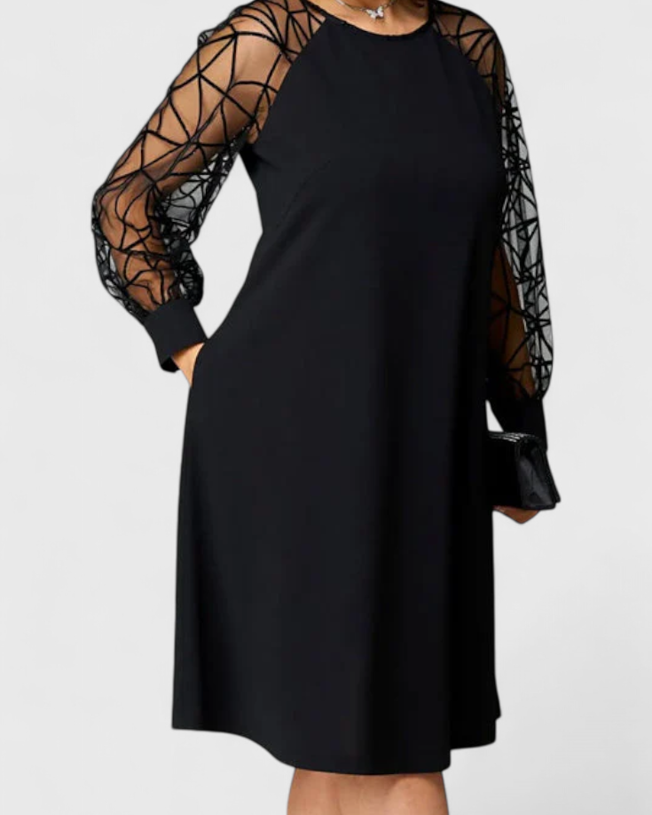 Bellezza Vestido Negro con Mangas de Malla y Corte Holgado