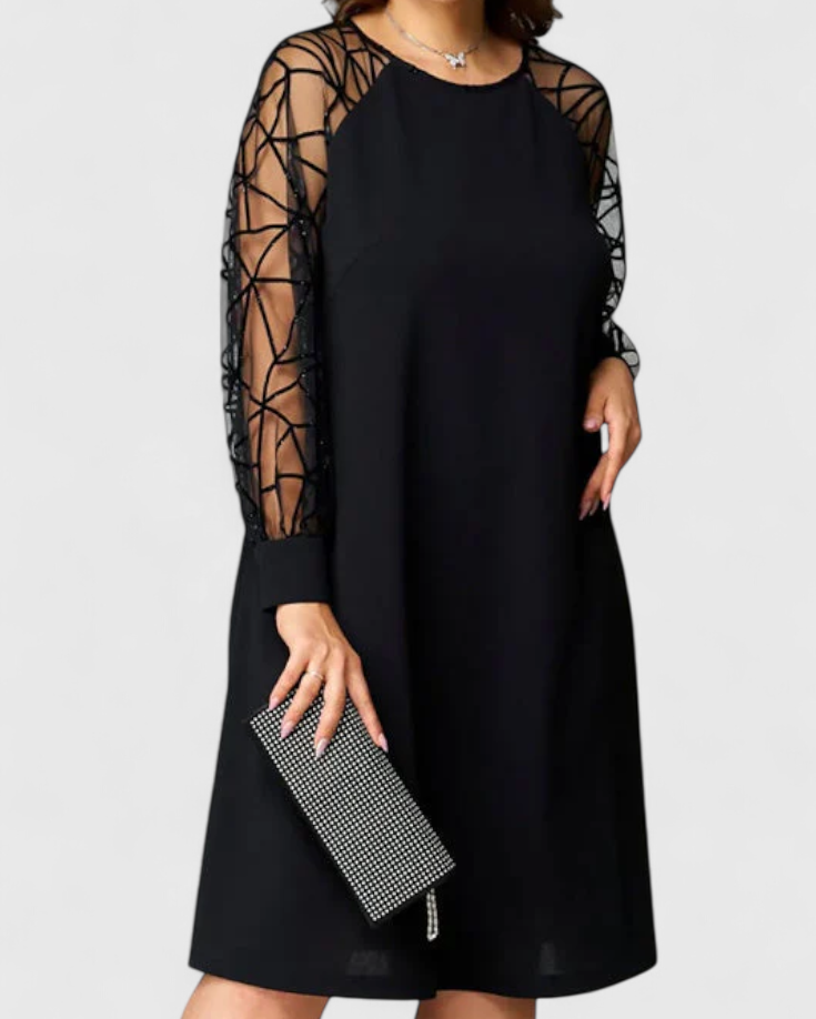 Bellezza Vestido Negro con Mangas de Malla y Corte Holgado